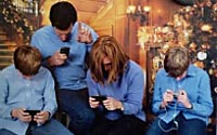 Family-looking-at-Phones