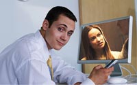 Guy-watching-Video-on-Computer- Guy-watching-Video-on-Computer-