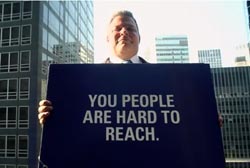 Man-holding-sign-B