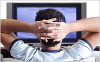 Watching-TV-Shutterstock Watching-TV-Shutterstock
